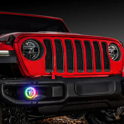 Red Jeep Gladiator with rainbow fog light halos installed.