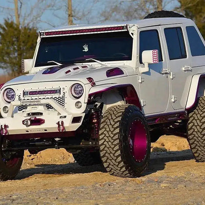 Three quarters view of a Jeep Wrangler JK with LED Off-Road Side Mirrors installed.