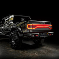 Rear view of Jeep Gladiator JT with Racetrack Tail Gate brake light on