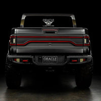 Rear view of Jeep Gladiator JT with Racetrack Tail Gate brake light on