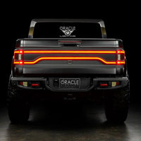 Rear view of Jeep Gladiator JT with Racetrack Tail Gate brake light on