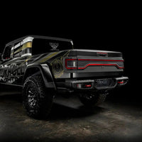 Rear view of Jeep Gladiator JT with Racetrack Tail Gate brake light on