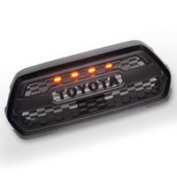 2016-2023 Gen 3 Toyota Tacoma TRD PRO Pre-Runner Style LED Grill Light Kit with four light mounts.