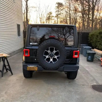 Rear end of a Jeep Wrangler JL with Black Series LED Tail Lights installed.