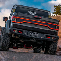 Rear view of Jeep Gladiator JT with Racetrack Tail Gate brake light on
