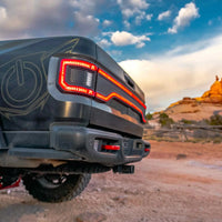 Rear view of Jeep Gladiator JT with Racetrack Tail Gate brake light on