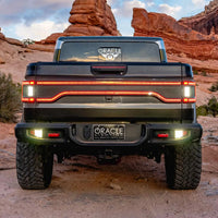 Rear view of Jeep Gladiator JT with Racetrack Tail Gate brake light on