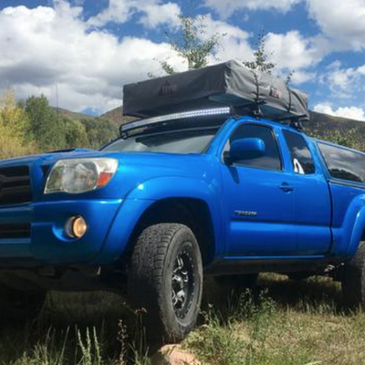 Blue 2005-2023 Toyota Tacoma with Roof Brackets