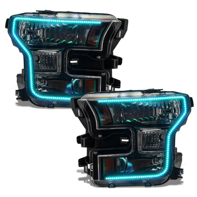 Ford F-150 headlights with cyan halos.
