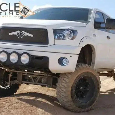 Three quarters view of a Toyota Tundra with white LED headlight halo rings installed.