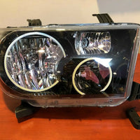 ORACLE 2007-2013 TOYOTA TUNDRA BLACK HEADLIGHTS WITH WHITE LED HALOS 7119-001 - CLEARANCE