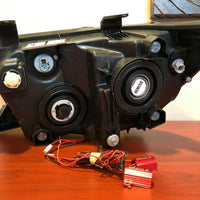 ORACLE 2007-2013 TOYOTA TUNDRA BLACK HEADLIGHTS WITH WHITE LED HALOS 7119-001 - CLEARANCE