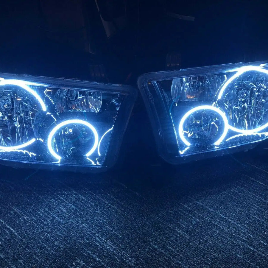 ORACLE 2007-2013 TOYOTA TUNDRA BLACK HEADLIGHTS WITH WHITE LED HALOS 7119-001 - CLEARANCE